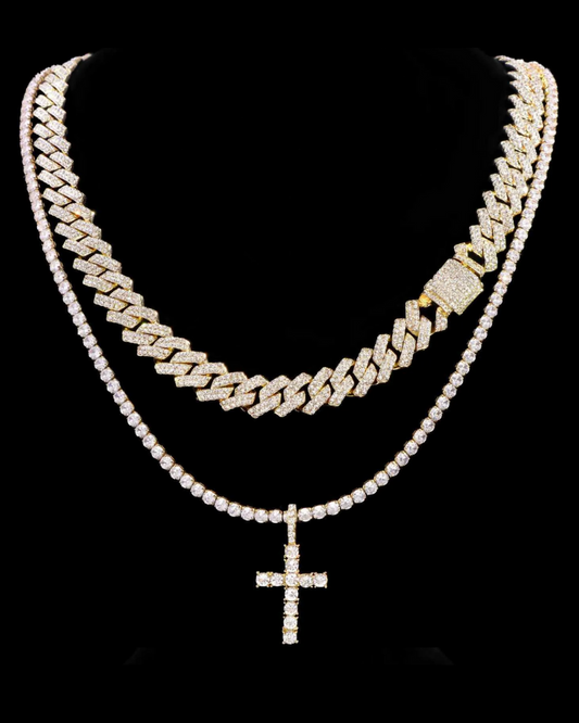 Two gold chains with diamond accents on a black background