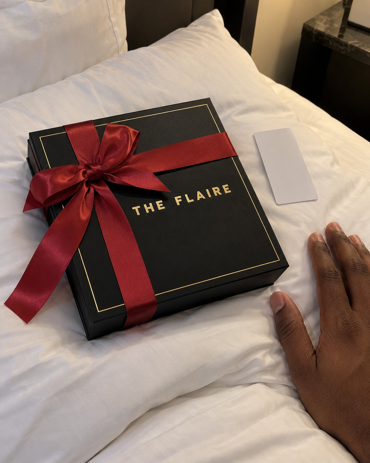 Ember Four-Piece Gift Box Gold: on her pillow