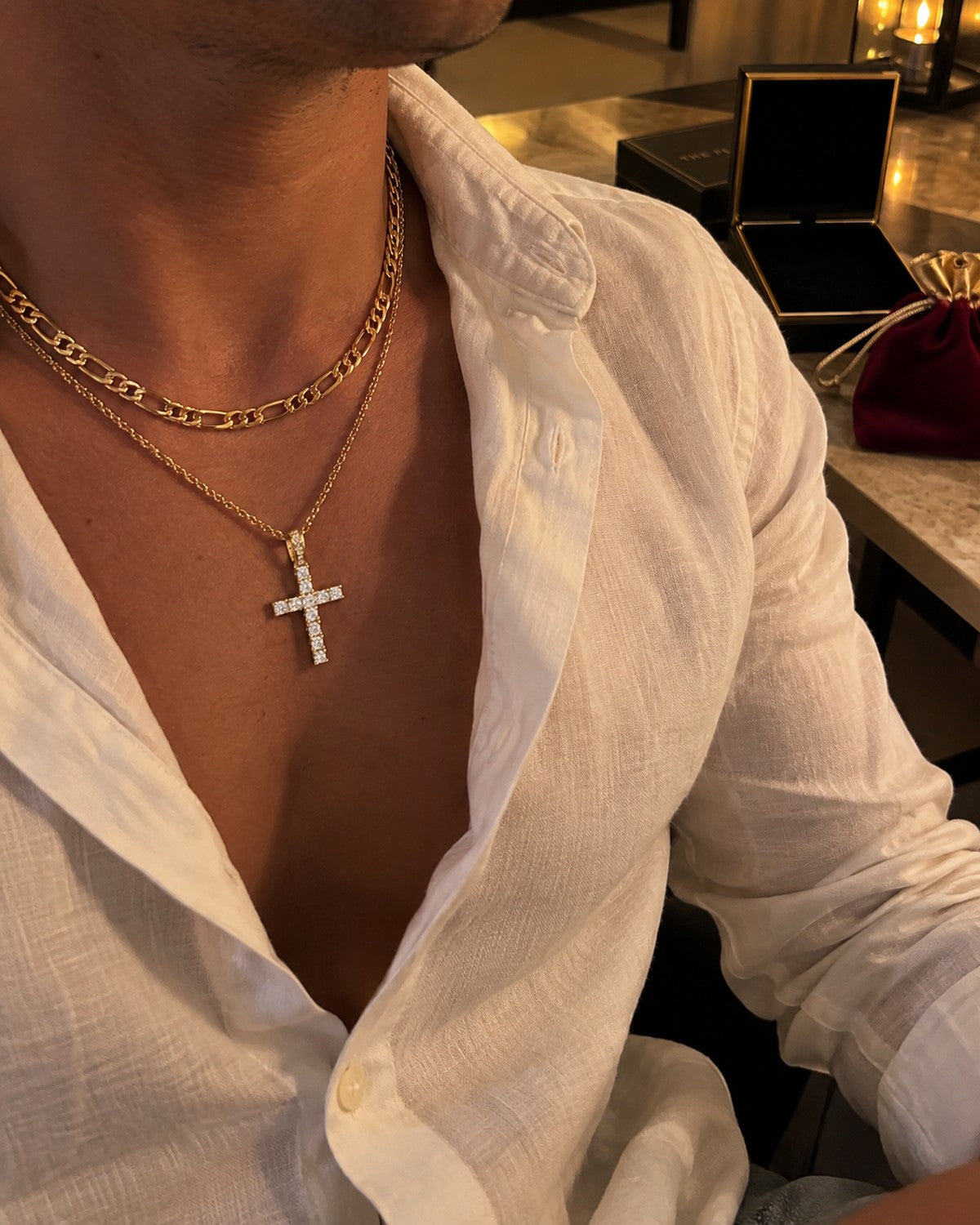 Figaro chain and Cassian cross layered, worn minutes after opening