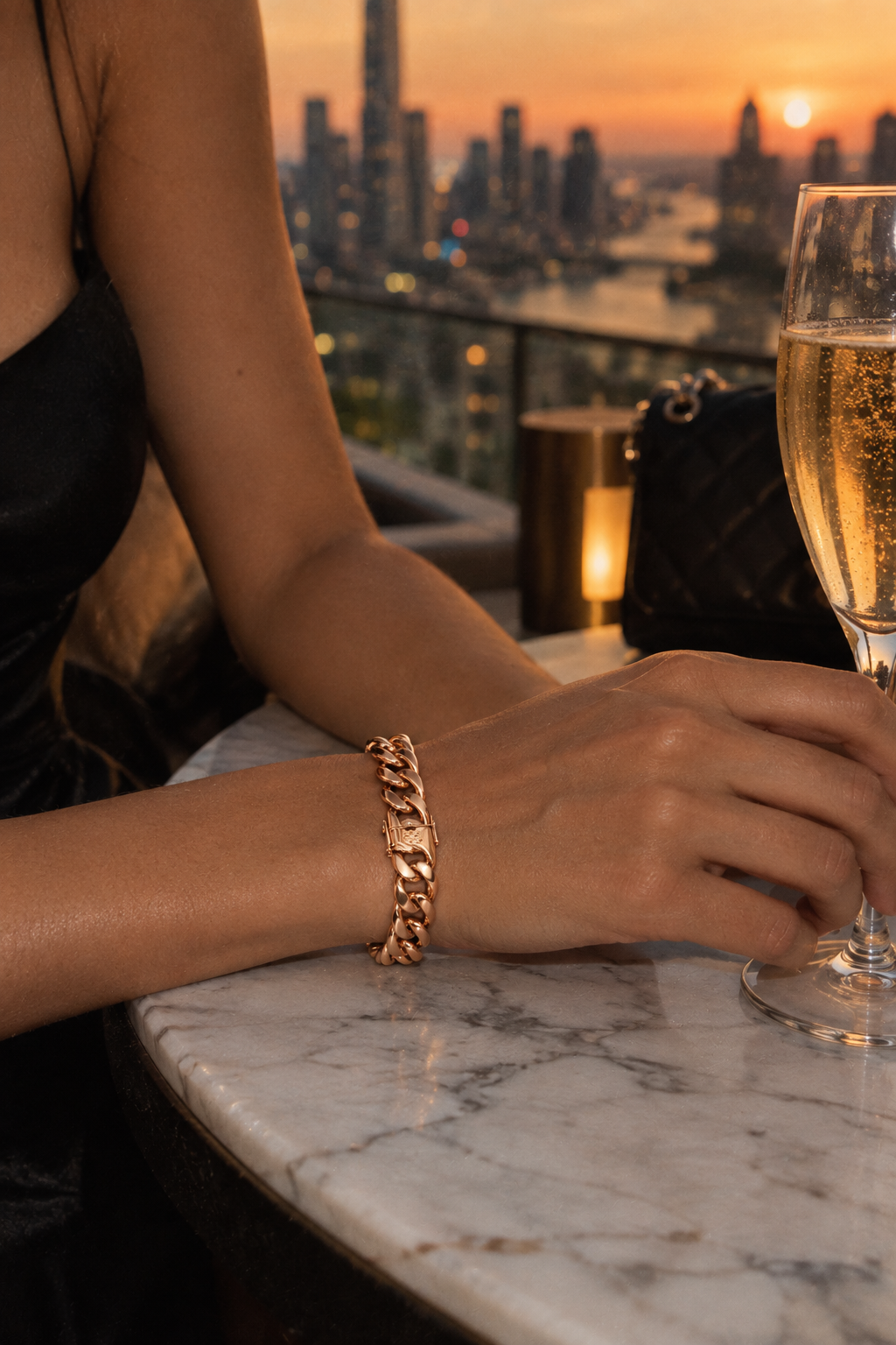 Luxor Bracelet Rose Gold worn at a rooftop bar