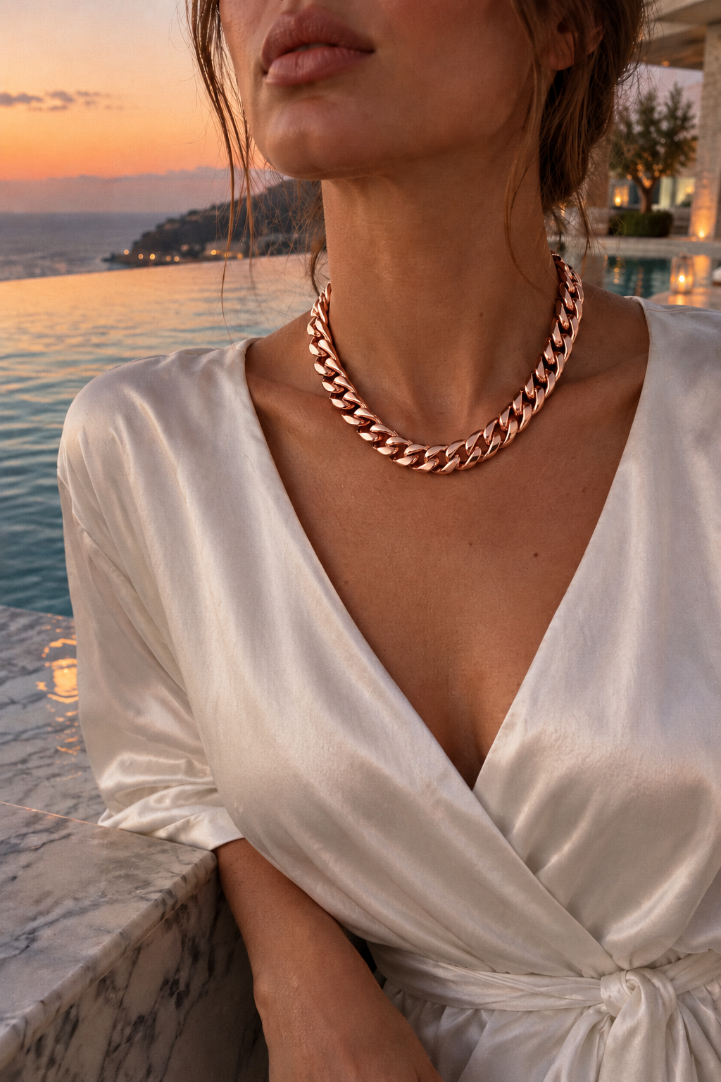 Luxor Chain Rose Gold worn at a villa infinity pool at dusk