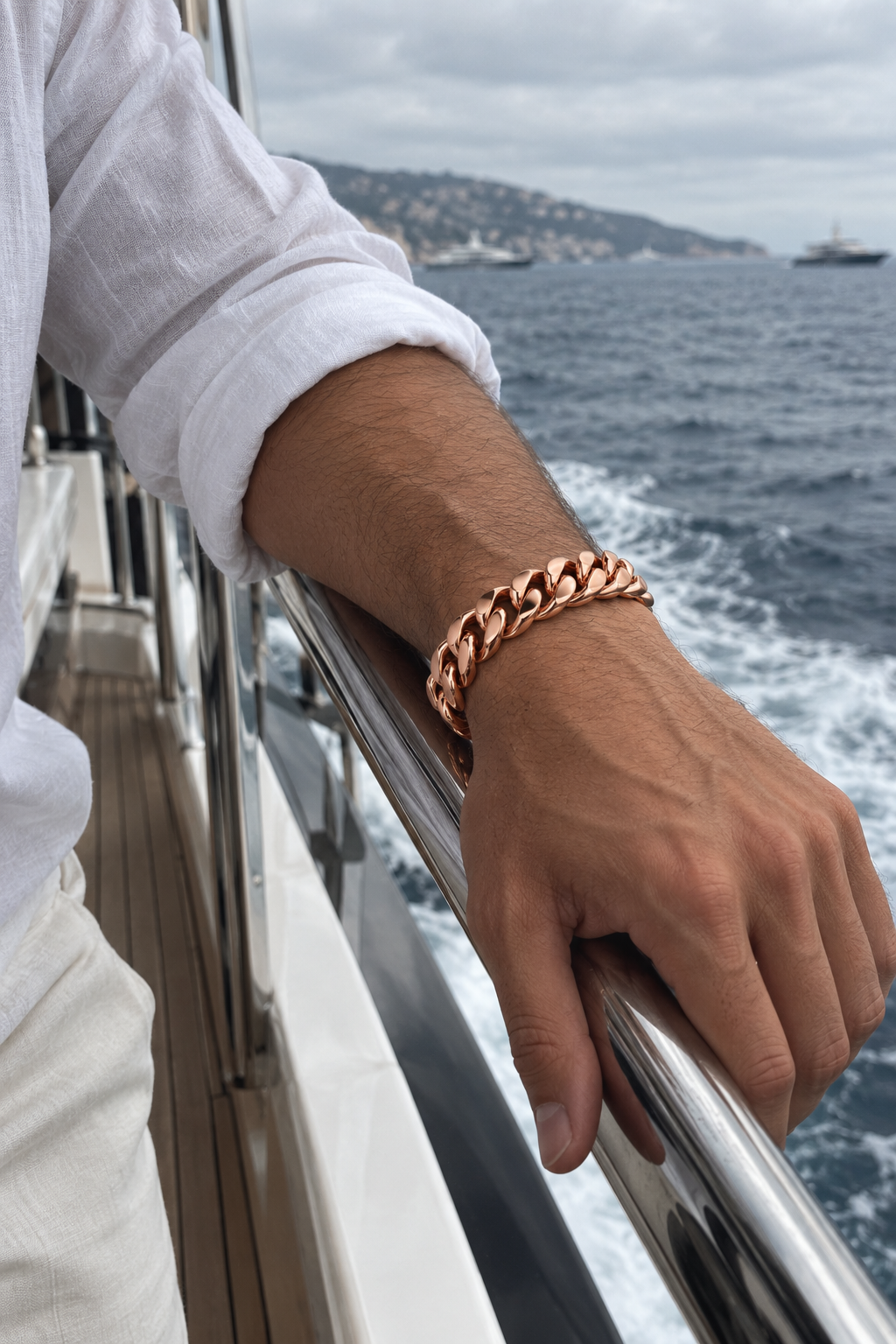 Luxor Bracelet Rose Gold worn on a superyacht railing